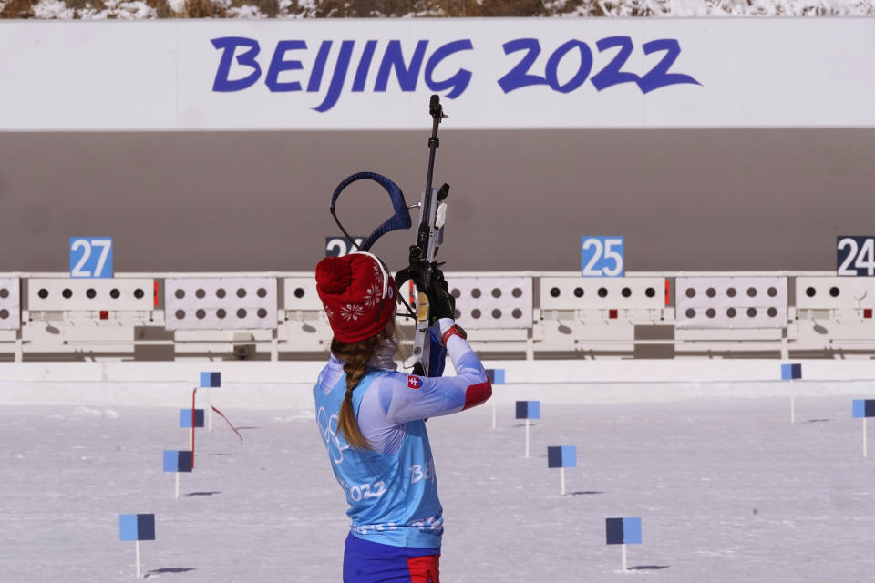 FILE - A biathlete from Slovakia prepares to shoot during practice at the 2022 Winter Olympics, Feb. 3, 2022, in Zhangjiakou, China. (AP Photo/Carlos Osorio, File)