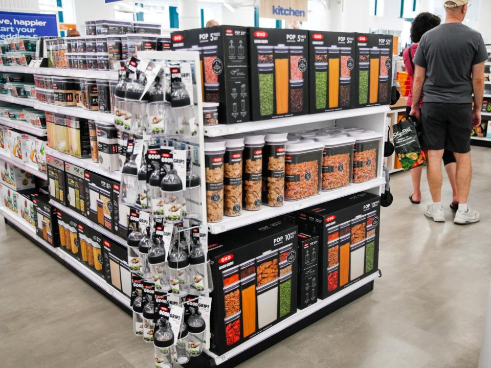 kitchen and cooking tools arranged neatly onshelves