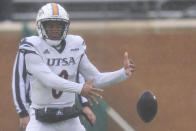 UTSA quarterback Frank Harris fumbles the ball during the first half of an NCAA college football game against North Texas in Denton, Texas, Saturday, Nov. 27, 2021. (AP Photo/Andy Jacobsohn)