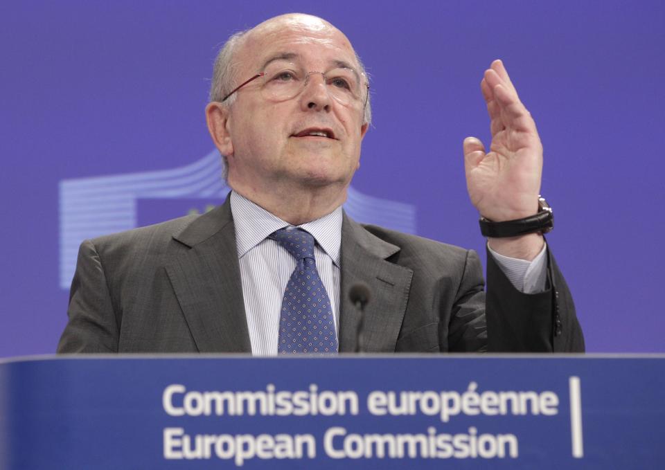 European Commissioner for Competition Joaquin Almunia addresses the media at the European Commission headquarters in Brussels, Tuesday, April 29, 2014. The European Commission says Motorola Mobility, which Google is selling to China’s Lenovo, has abused its market position in Europe by refusing to grant crucial technology licenses to rival Apple, then suing Apple for infringement. (AP Photo/Yves Logghe)