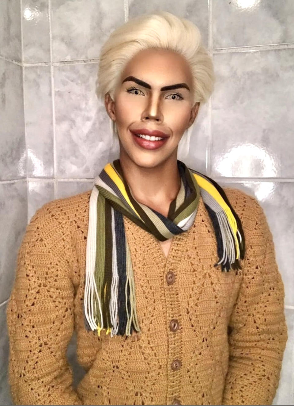  A 17-year-old boy spends four hours per day applying makeup to look like his favourite doll, Ken 