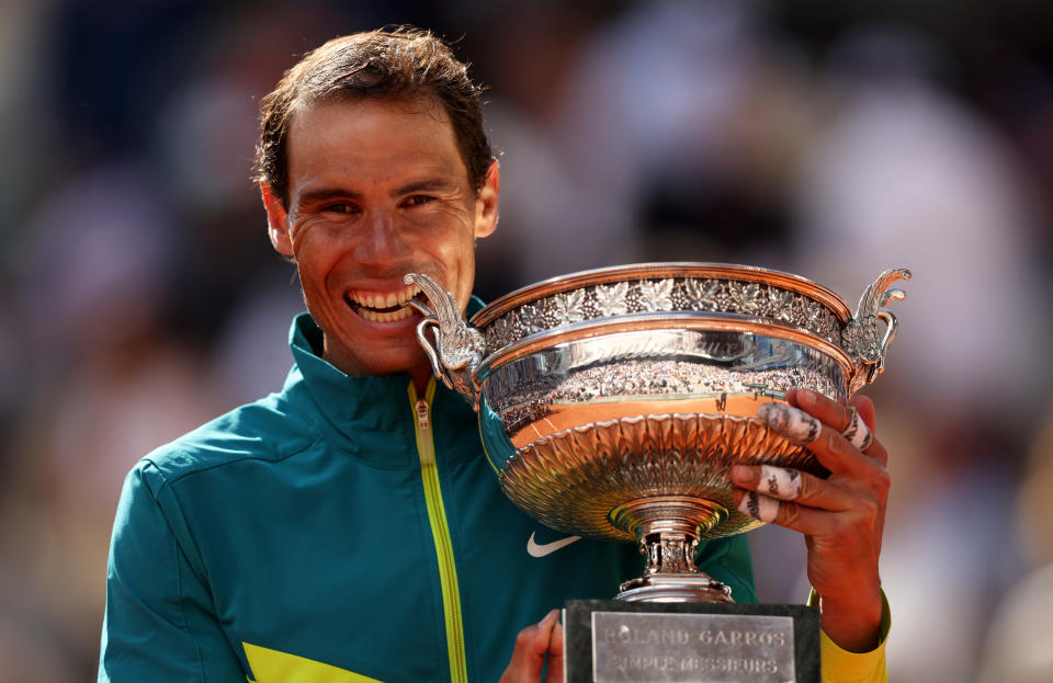 Rafa Nadal, pictured here celebrating with the trophy after winning the French Open for a 14th time.