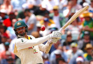 Cricket - Ashes test match - Australia v England - WACA Ground, Perth, Australia, December 17, 2017. Australia's Nathan Lyon hits a boundary during the fourth day of the third Ashes cricket test match. REUTERS/David Gray