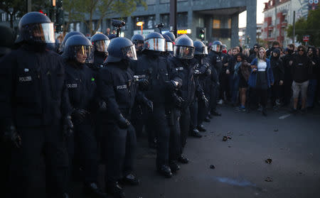 Police stand in formation during a left wing May Day demonstration in Berlin, Germany, May 1, 2019. REUTERS/Hannibal Hanschke