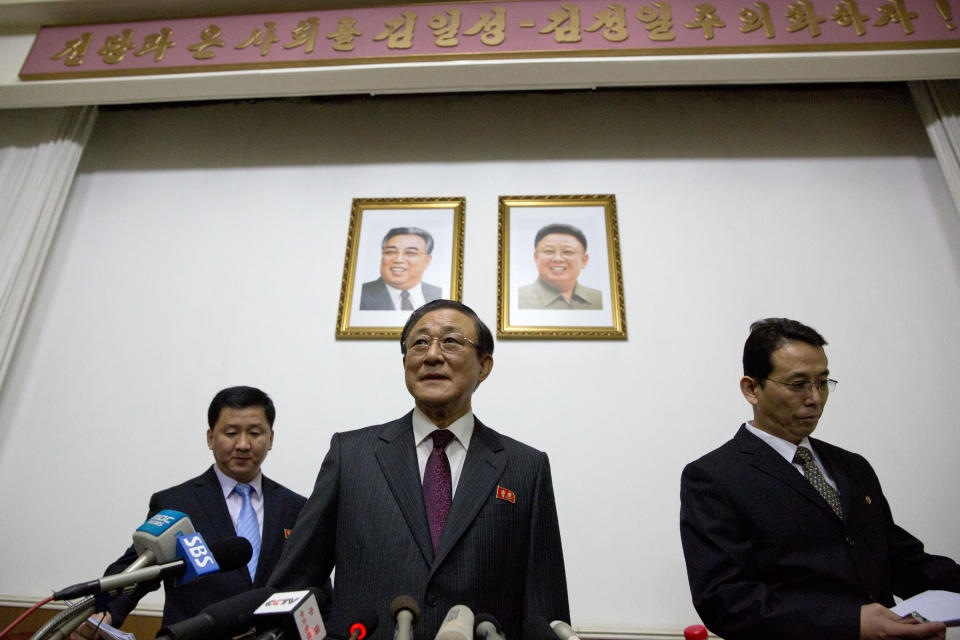 North Korean Ambassador to China Ji Jae Ryong, center, and two translators take their seats before a press conference at the North Korean Embassy in Beijing, China, Wednesday, Jan. 29, 2014. North Korea’s propaganda machine is churning out near-daily diatribes against the United States and South Korea for a series of soon-to-start military maneuvers, warning nuclear war could be imminent and saying it will take dramatic action of its own if further provoked. Ji offered a somewhat less caustic line at a rare news conference on Wednesday. Ji told international media the north wanted to reduce tensions to allow steps toward reconciliation and eventual unification between North and South. (AP Photo/Alexander F. Yuan)