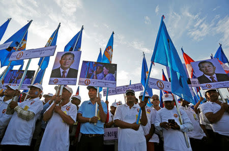 Supporters of the Cambodian People's Party (CPP) attend campaign rally on final day of campaigning in Phnom Penh, Cambodia, July 27, 2018. REUTERS/Samrang Pring