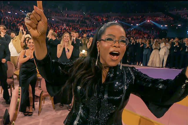 <p>Francis Specker/CBS</p> Oprah Winfrey dancing at the Grammys