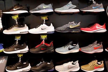 FILE PHOTO: Nike shoes are seen displayed at a sporting goods store in New York