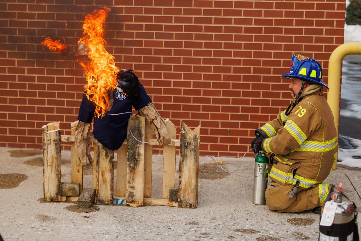 Hanover Area Fire & Rescue volunteer lieutenant Paul Zartman controls the flow of oxygen as burning oxygen tubing lights off a t-shirt on a mannequin while Hanover Area Fire & Rescue firefighters perform a demonstration of smoking while using home oxygen, Tuesday, Jan. 23, 2024, at the Clover Lane firehouse in Penn Township.