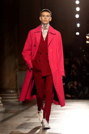 A model presents a creation by designer Kris Van Assche as part of his Fall/Winter 2019-2020 collection show for fashion house Berluti during Men's Fashion Week in Paris, France, January 18, 2019. REUTERS/Gonzalo Fuentes