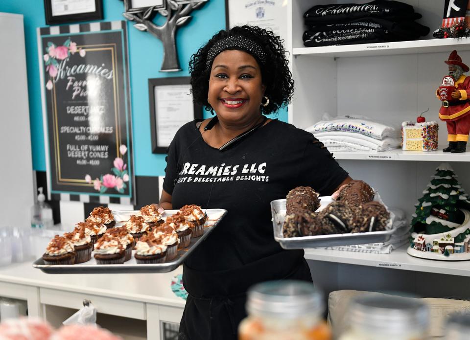 Joccola Thomas, owner of Kreamies LLC, prepares pastries such as maple-bacon salted caramel cupcakes, dessert cones and Dessert Jarz at her bakery in Bellmawr. Kreamies will have plenty of Thanksgiving pies and other treats available.