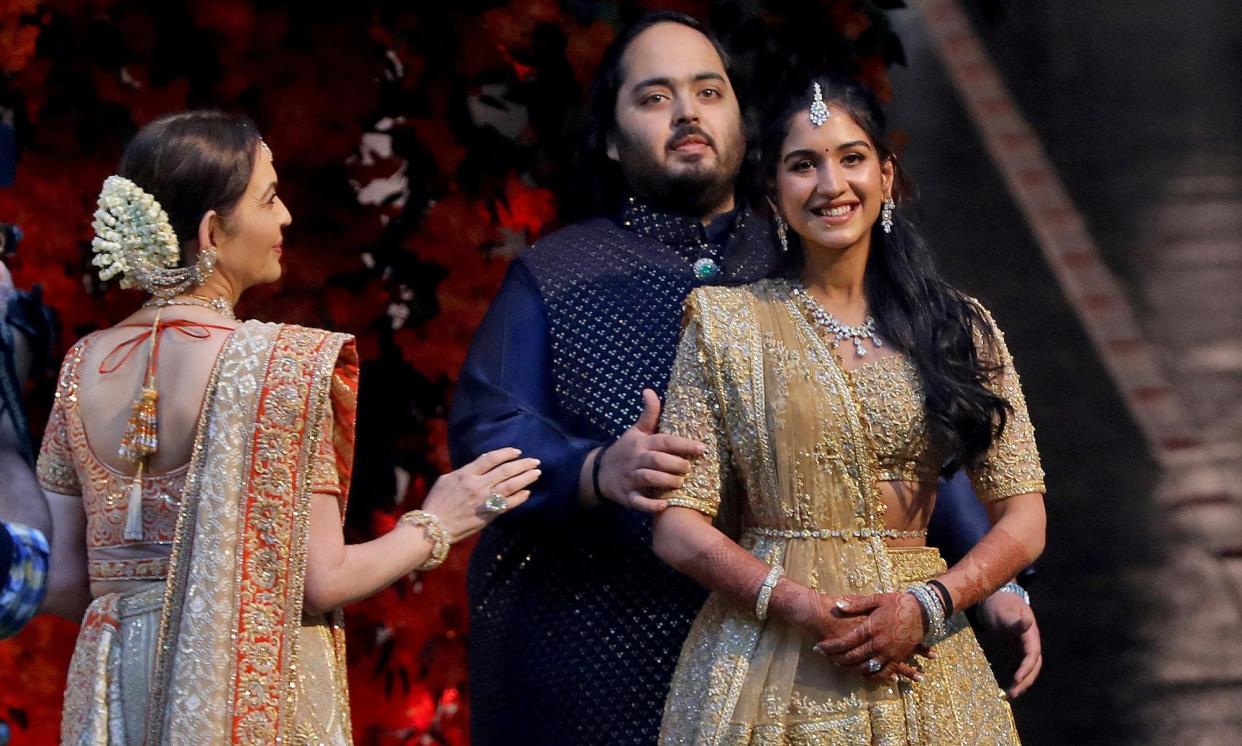 <span>A red carpet ceremony marking the engagement of Anant Ambani and Radhika Merchant in Mumbai, India.</span><span>Photograph: Niharika Kulkarni/Reuters</span>