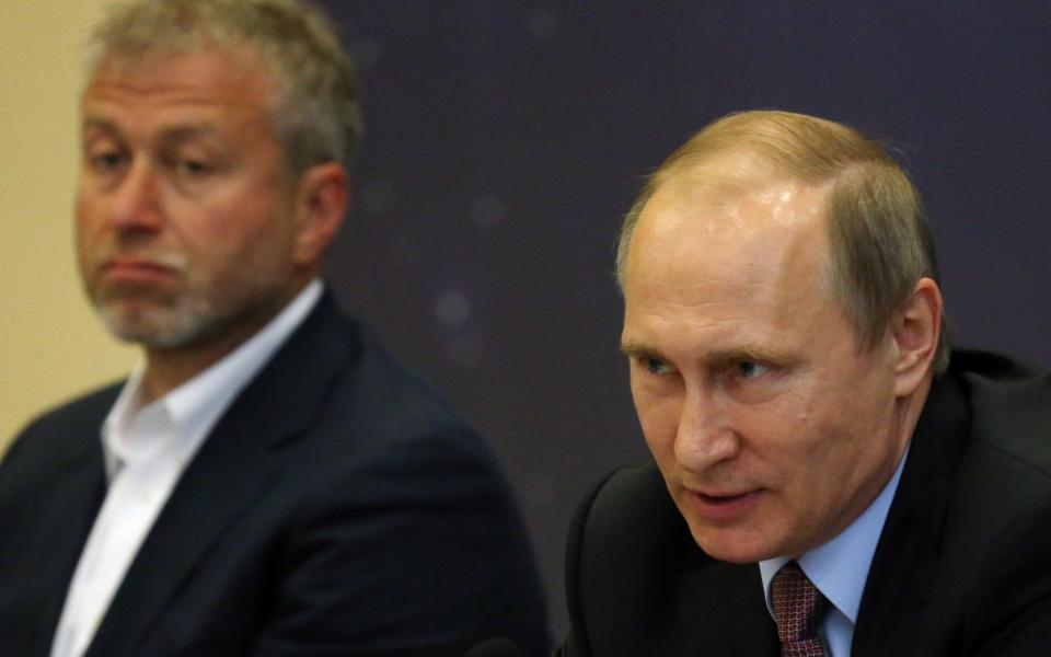 Roman Abramovich sits next to Vladimir Putin in a 2016 meeting in Sochi, Russia - Mikhail Svetlov /Getty Images Europe 