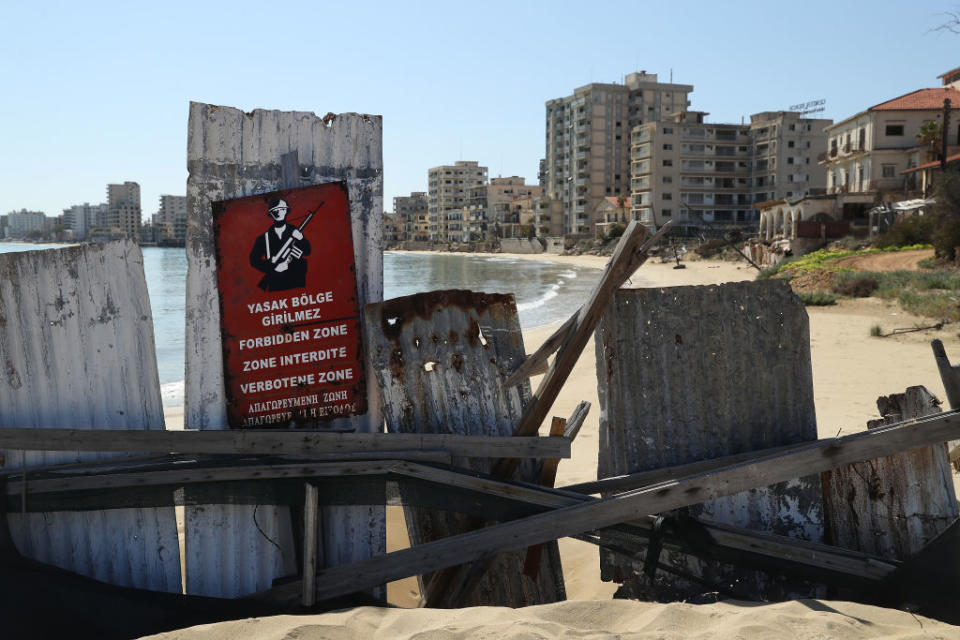 Pictured is a metal fence blocking entry to Varosha. 