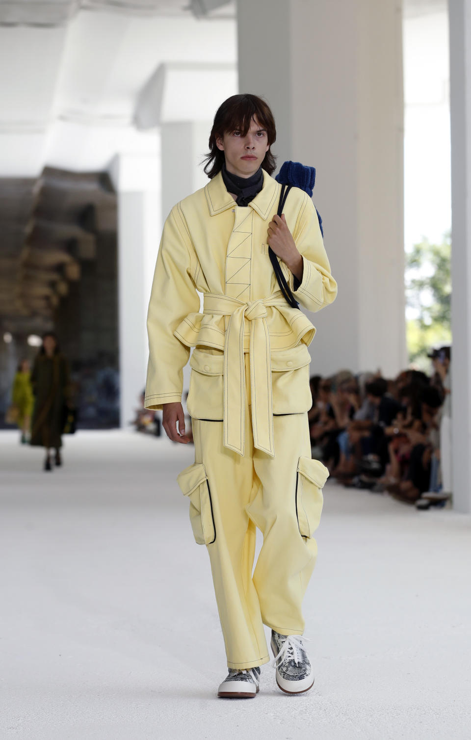 A model wears a creation as part of the Sunnei men's Spring-Summer 2020 collection, unveiled during the fashion week in Milan, Italy, Sunday, June 16, 2019. (AP Photo/Antonio Calanni)