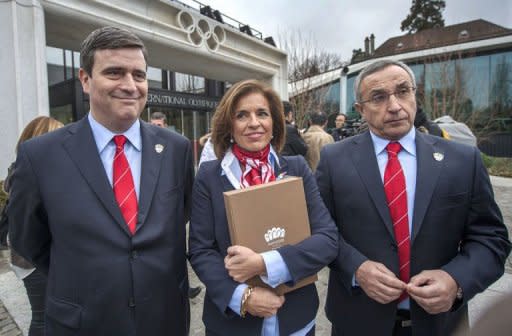 Members of the delegation of Madrid (L to R) Miguel Cardenal, president of Council of SportAna Botella, Mayor of Madrid and Alejandro Blanco, IOC member pose , Ana Botella, Mayor of Madrid and Alejandro Blanco pose with the candidature files prior to the hand over, on January 7, 2013 at the headquarters of the International Olympic Committee in Lausanne