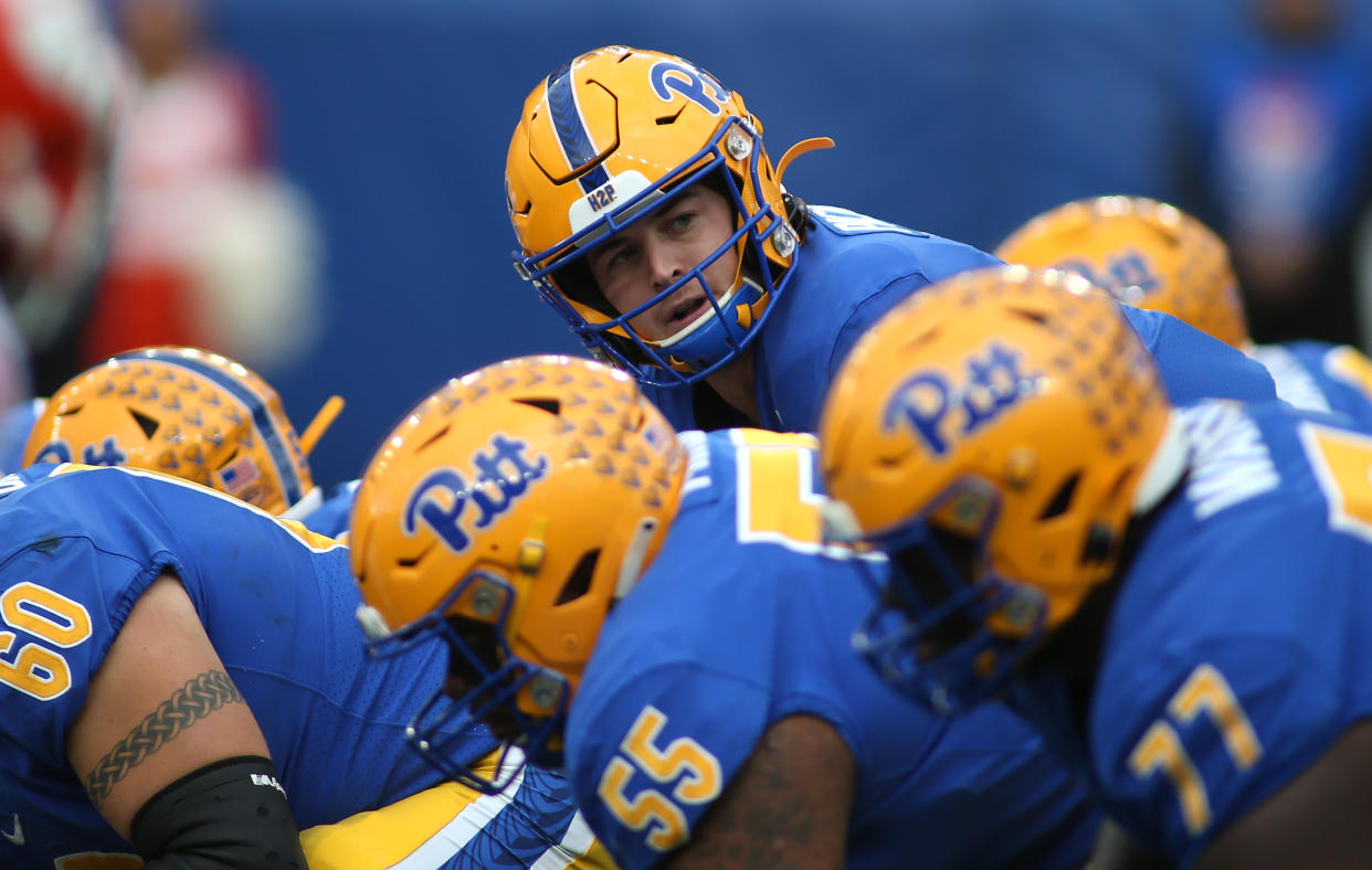 PITTSBURGH, PA - OCTOBER 23: Kenny Pickett #8 of the Pittsburgh Panthers looks over his Offensive Line during the first half against the Clemson Tigers on October 23, 2021 at Heinz Field in Pittsburgh, PA. (Photo by Michael Longo/Icon Sportswire via Getty Images)