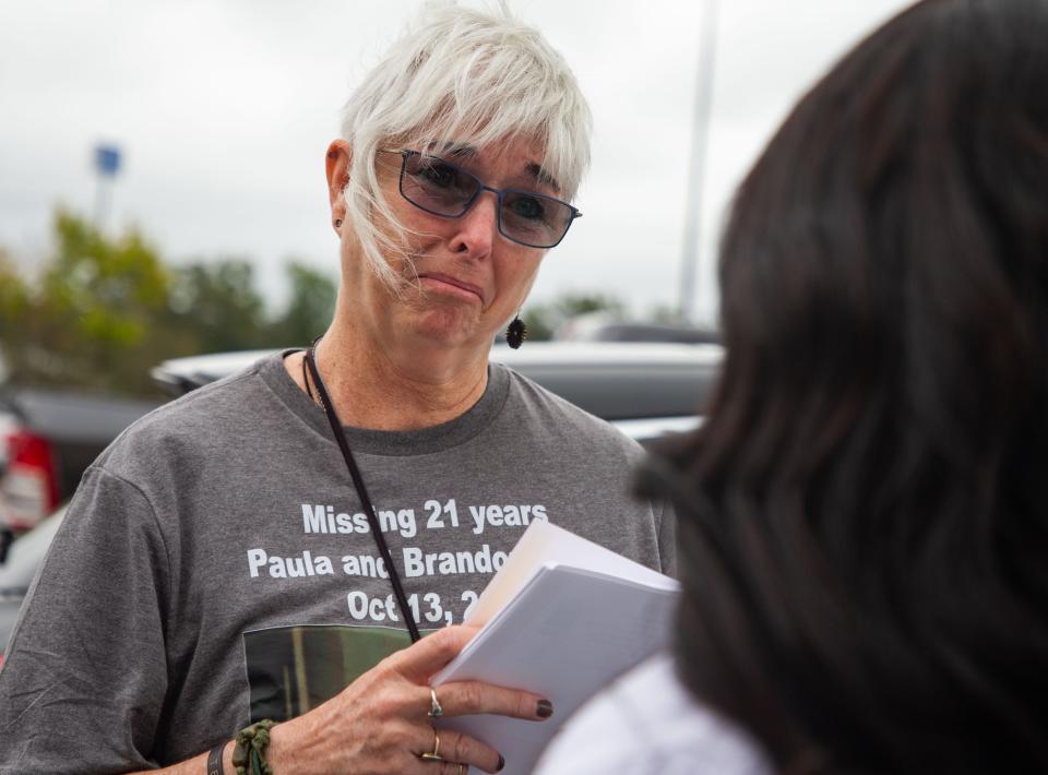 In a chance encounter on Saturday, Mary Ramsbottom listens to Sam's Club assistant manager Maria Manning share stories about her younger sister on the anniversary of her disappearance.