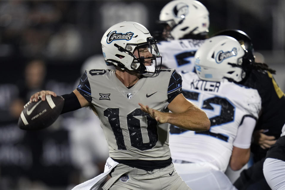 Central Florida quarterback John Rhys Plumlee (10) throws a pass during the first half of the NCAA college football team's annual spring game, Friday, April 14, 2023, in Orlando, Fla. (AP Photo/John Raoux)