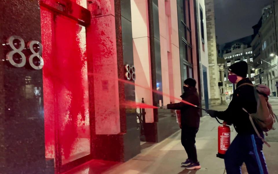 The offices of Probitas 1492 were sprayed red in London by activists