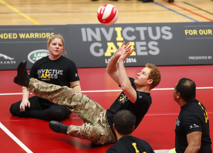 LONDON, UNITED KINGDOM - MARCH 06: (EMBARGOED FOR PUBLICATION IN UK NEWSPAPERS UNTIL 48 HOURS AFTER CREATE DATE AND TIME) Prince Harry plays sitting Volleyball during the launch of the Invictus Games at the Copper Box Arena in the Queen Elizabeth Olympic Park on March 6, 2014 in London, England. The Invictus Games for wounded, injured and sick service personnel will use the power of sport to inspire recovery, support rehabilitation and generate a wider understanding of those who serve the country. Prince Harry has brought the Games to the UK following a trip to see the Warrior Games in Colorado in 2013. 300 competitors from around the world will take part in the games from the 10th-14th September. (Photo by Max Mumby/Indigo/Getty Images)
