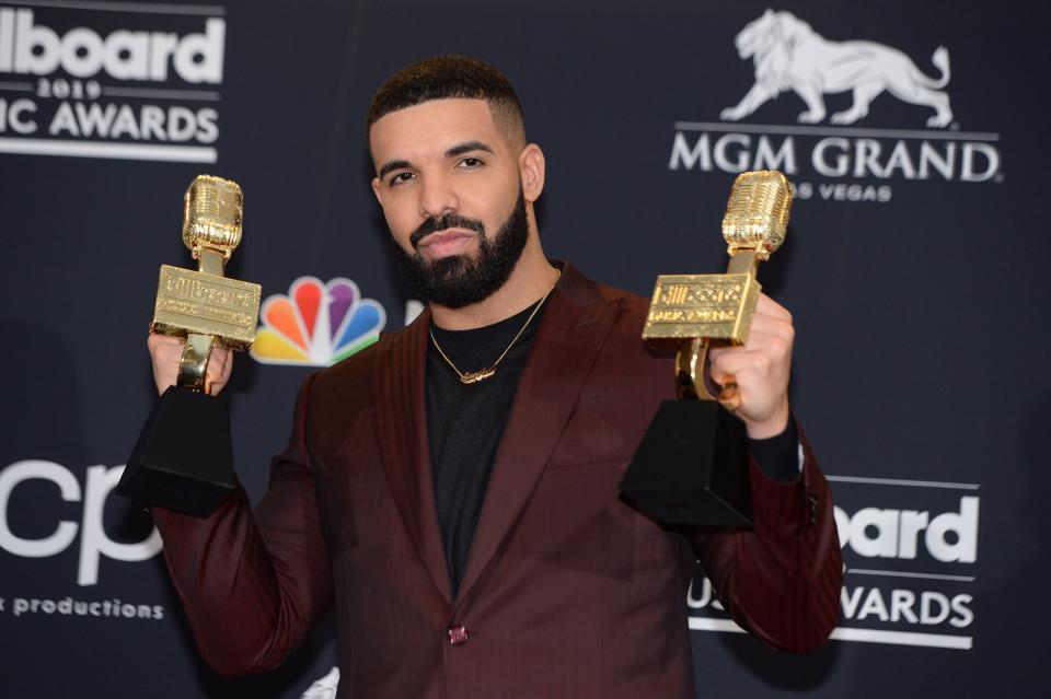 Canadian rapper Drake poses in the press room during the 2019 Billboard Music Awards.