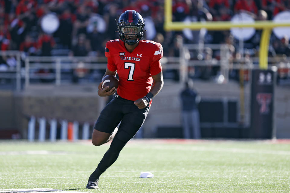 Texas Tech's Donovan Smith (7) runs with the ball during the first half of an NCAA college football game against Iowa State, Saturday, Nov. 13, 2021, in Lubbock, Texas. (AP Photo/Brad Tollefson)