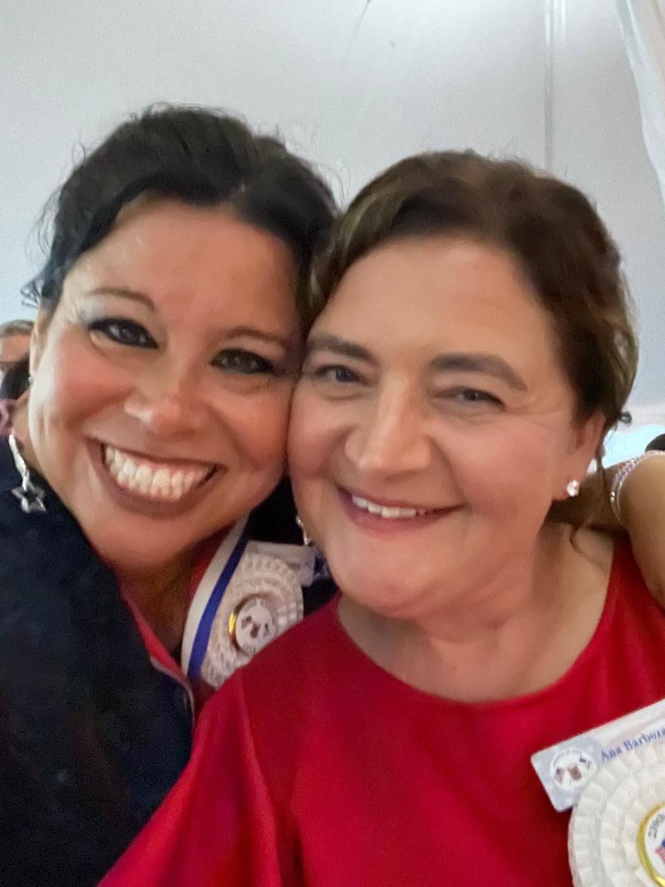 Camille Teixeira and Ana Motta, general chairman and vice chairman of the Bristol Fourth of July celebrations, pose for a photo.