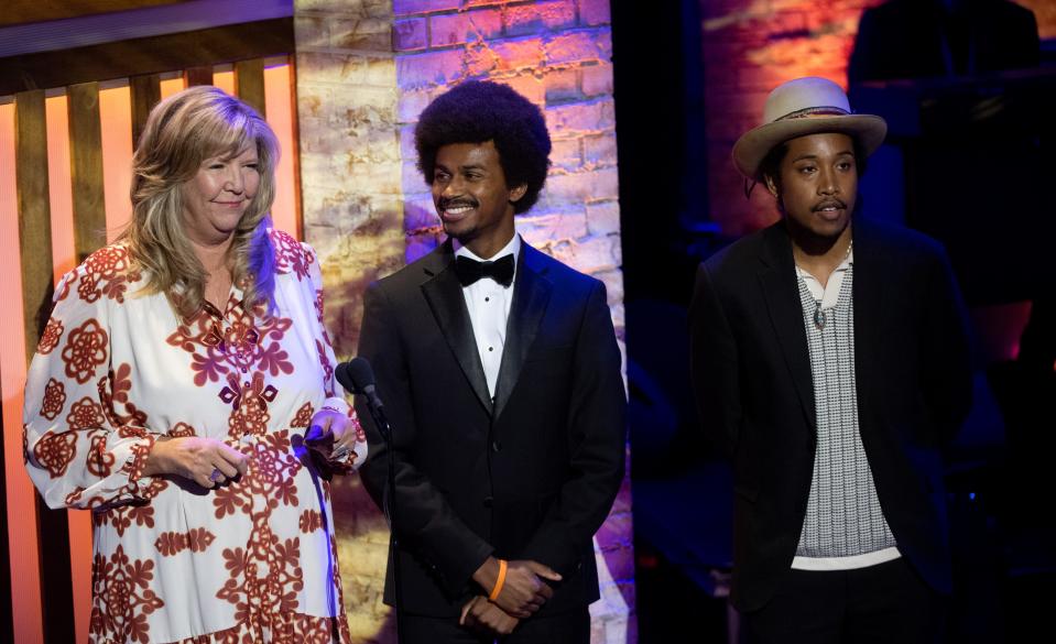 Democratic state representatives Gloria Johnson, Justin Pearson and Justin Jones present the Spirit of Americana Award to Allison Russel during the Americana Music Association Awards and Honors at the Ryman Auditorium in Nashville, Tenn., Wednesday, Sept. 20, 2023.