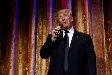 U.S. President-elect Donald Trump speaks to diplomats at the Presidential Inaugural Committee (PIC) Chairman's Global Dinner in Washington, U.S. January 17, 2017. REUTERS/Jonathan Ernst