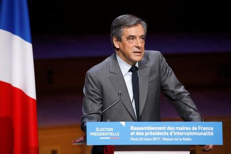 FILE PHOTO: Francois Fillon, former French prime minister, member of the Republicans political party and 2017 presidential election candidate of the French centre-right, delivers his speech at the Association of the Mayors of France (AMF) conference in Paris, France, March 22, 2017. REUTERS/Charles Platiau