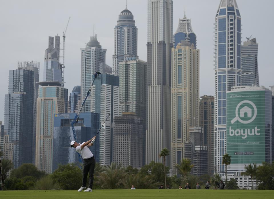 Rory McIlroy of Northern Ireland plays his second shot on the 13th hole during the first round of the Dubai Desert Classic, in Dubai, United Arab Emirates, Thursday, Jan. 26, 2023. (AP Photo/Kamran Jebreili)