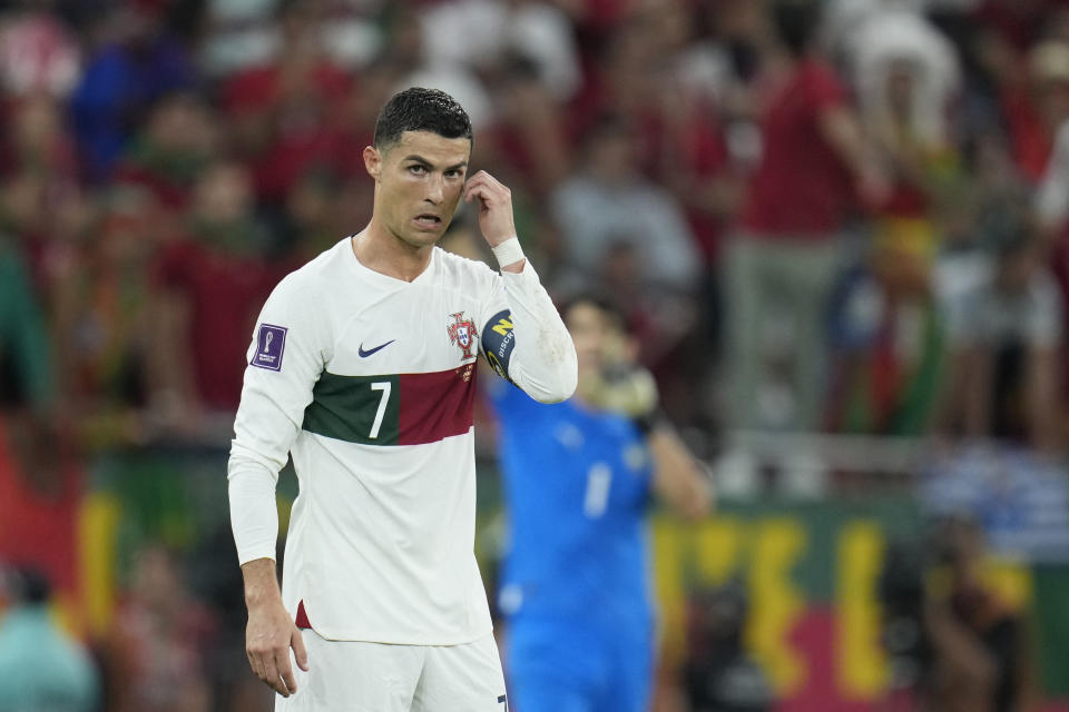 Portugal's Cristiano Ronaldo walks on the pitch during the World Cup quarterfinal soccer match between Morocco and Portugal, at Al Thumama Stadium in Doha, Qatar, Saturday, Dec. 10, 2022. (AP Photo/Ricardo Mazalan)