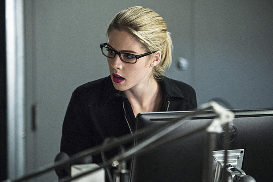 Felicity sitting at a computer