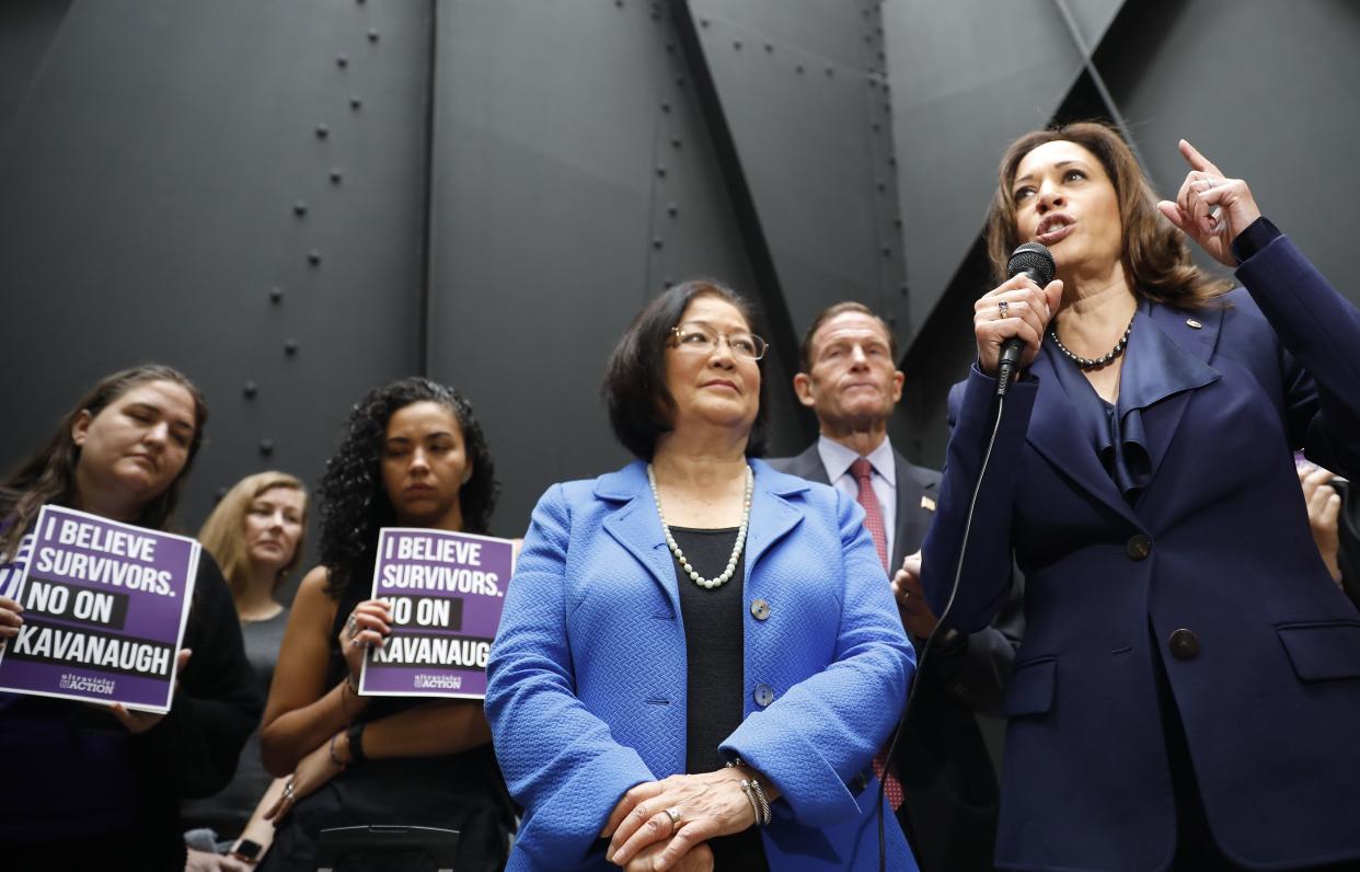 Senators Mazie Hirono (center) and Kamala Harris speak at a rally about Brett Kavanaugh's confirmation hearings and the sexual assault allegations against the judge. (Photo: Bloomberg via Getty Images)