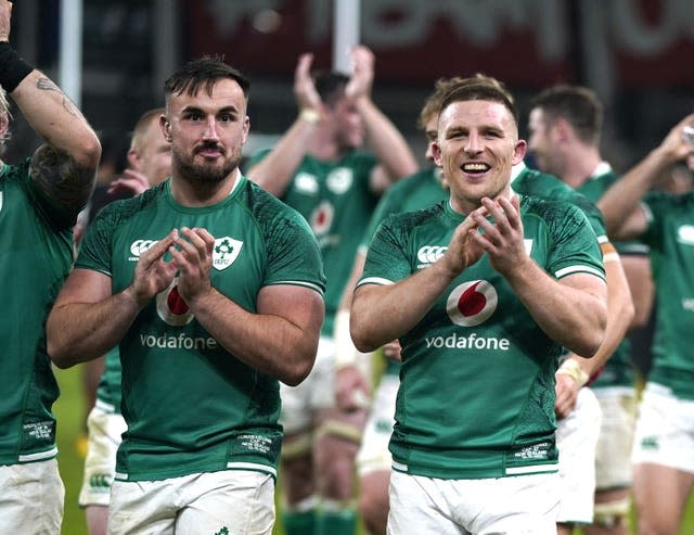 Try-scorer Ronan Kelleher, right, celebrates with Andrew Conway after victory over New Zealand