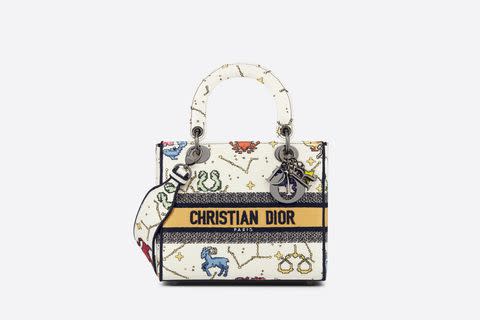 Lady D-Lite 拿鐵白星座圖案刺繡帆布提包 NTD150,000  PHOTO CREDIT: Dior