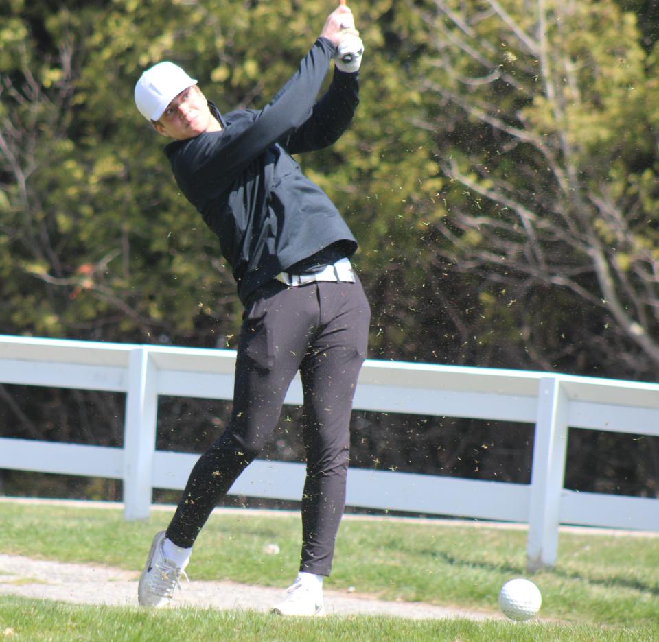 Cheboygan senior Gavin Rose watches his tee shot during the Cheboygan Invitational boys golf event at the Cheboygan Golf & Country Club on Monday.