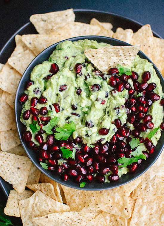 <strong>Get the <a href="http://cookieandkate.com/2014/festive-pomegranate-guacamole/" target="_blank">Festive Pomegranate Guacamole recipe</a> from Cookie + Kate</strong>