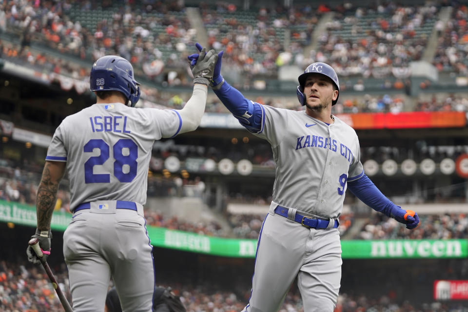 Kansas City Royals' Vinnie Pasquantino (9) is congratulated by Kyle Isbel (28) after hitting a home run against the San Francisco Giants during the fourth inning of a baseball game in San Francisco, Friday, April 7, 2023. (AP Photo/Eric Risberg)