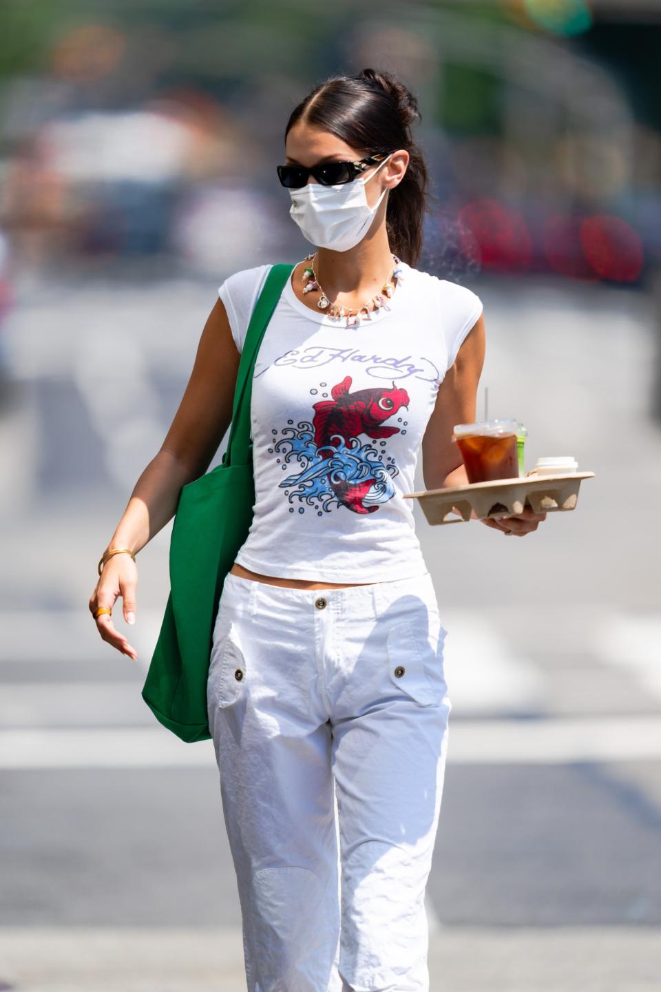 Bella Hadid, this month, in an Ed Hardy tee