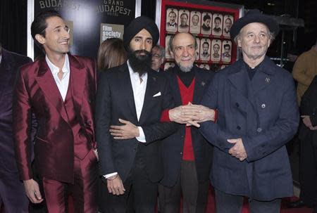 (L-R) Cast members Adrien Brody, Waris Ahluwalia, F. Murray Abraham and Bill Murray arrive for the premiere of "The Grand Budapest Hotel" in New York February 26, 2014. REUTERS/Carlo Allegri