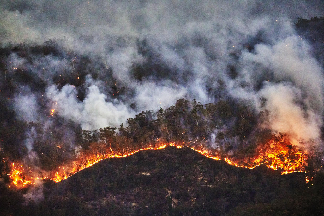 A new study suggests that an increase in global temperatures may lead to increased death in the U.S. Pictured above, wildfires in Australia. (Photo: Getty Images). 