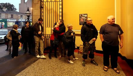 Voters wait for the polling station to open to cast their vote in Portobello near Edinburgh, Scotland September 18, 2014. REUTERS/Paul Hackett