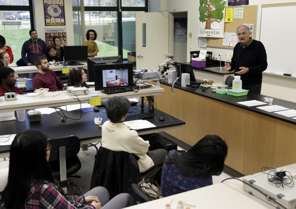 In this Friday, April 26, 2013 photo, actor Alan Alda addresses a Communicating Science class on the campus of Stony Brook University, on New York's Long Island. The film and television star is trying to encourage scientists of all disciplines to ditch the jargon and speak in plain English. (AP Photo/Richard Drew)