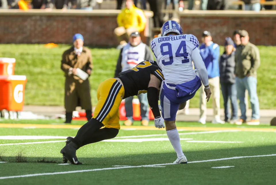 Kentucky punter Colin Goodfellow (94) saved the Wildcats 21-17 win at Missouri last year when he fielded an errant punt snap near the Wildcats goal line and got a punt off while being tackled by Missouri linebacker Will Norris. The resulting roughing the kicker call gave UK a first down and allowed the Wildcats offense to run all but the final 38 seconds of the game off the clock. Mathew Kirby/Columbia Daily Tribune