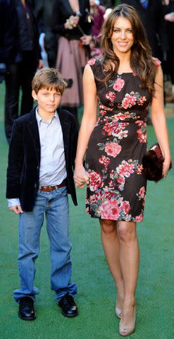 <p>REUTERS/Paul Hackett </p> Elizabeth Hurley and Damian in 2011