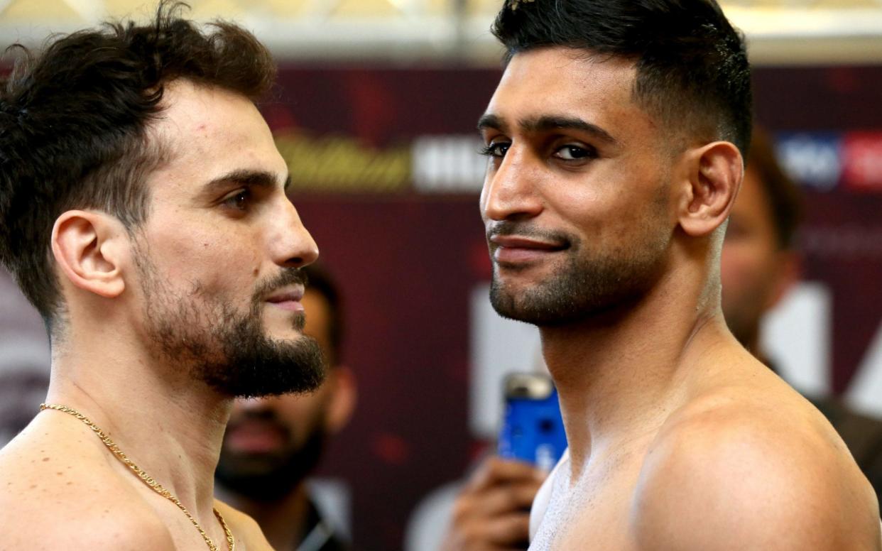 Amir Khan (right) fights Phil Lo Greco (left) tonight - PA