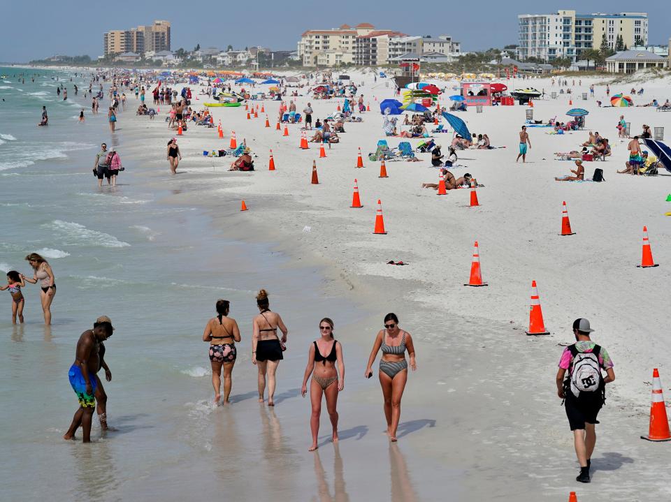 Beachgoers in Clearwater, FloridaAP
