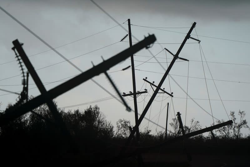 Downed power lines are seen after Hurricane Laura passed through the area in Creole